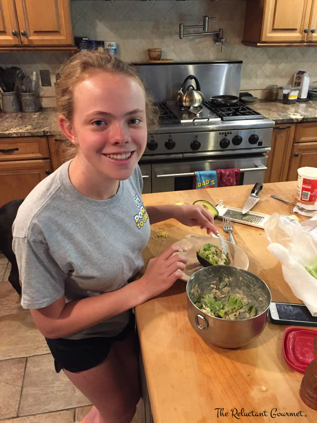 Maddie Preparing Leftover Salmon Salad with Avocado